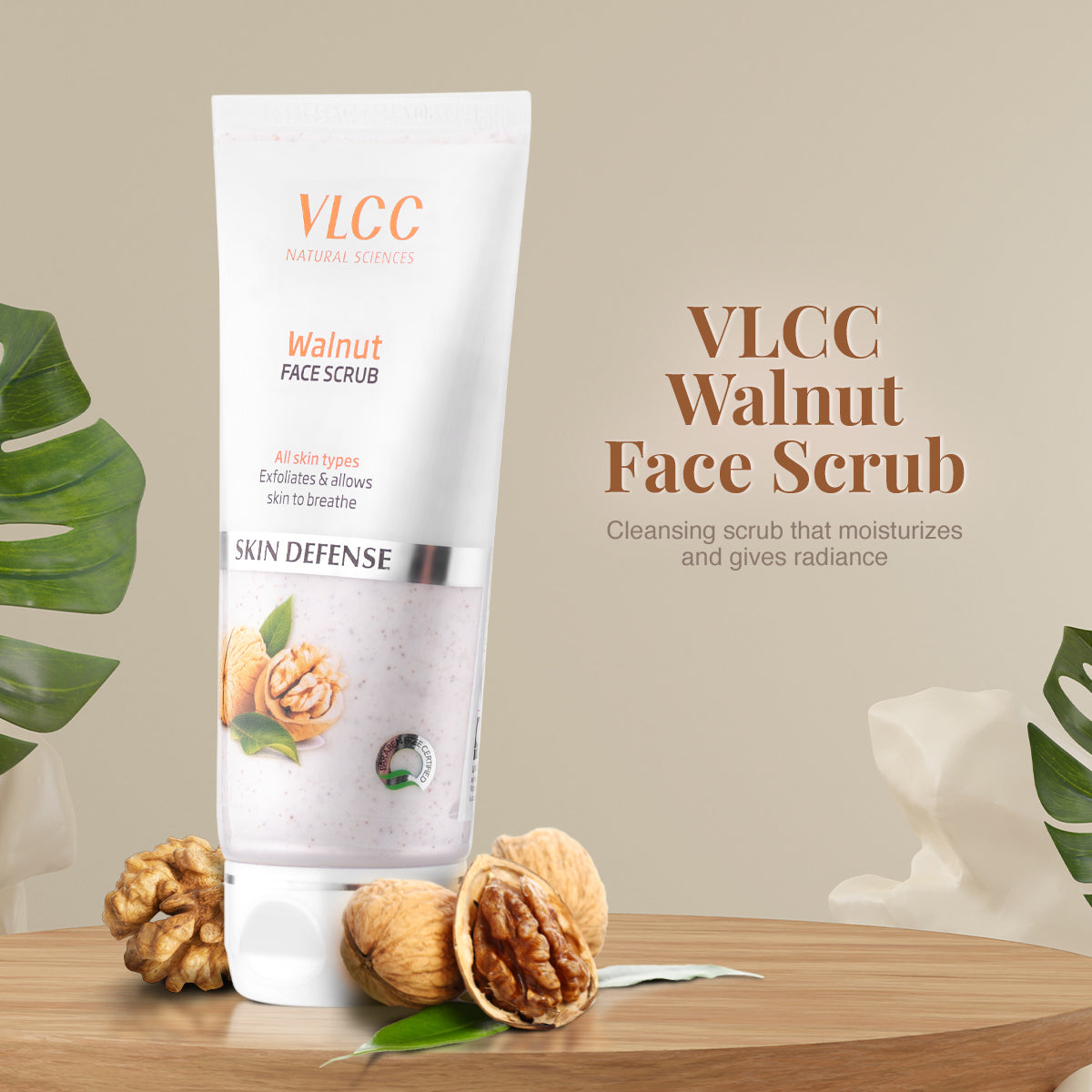 VLCC Walnut Face Scrub packaging with walnuts and leaves on a wooden surface